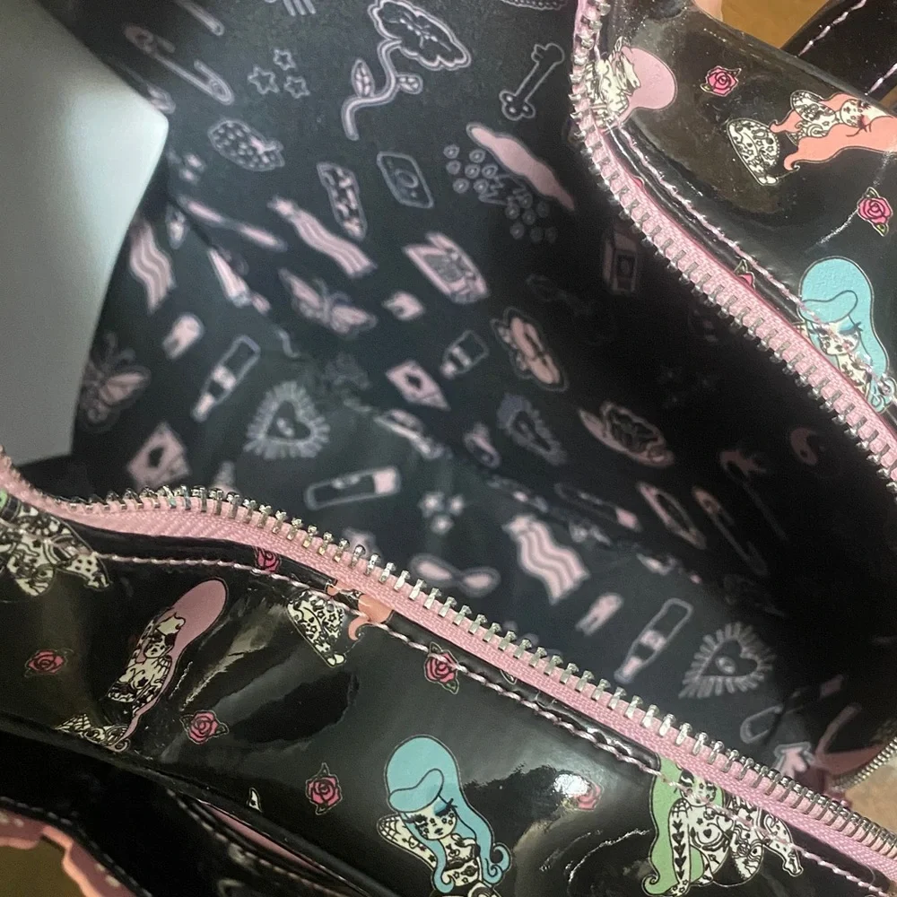 Loungefly Black Heart Backpack w Pink Trim & Multicolor Tattooed Character Print